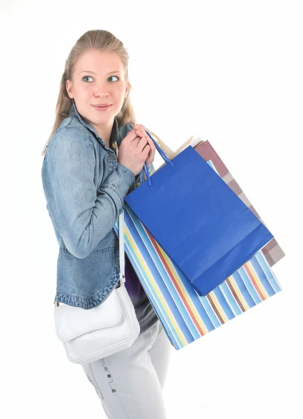 Chica joven con compras — Foto de Stock