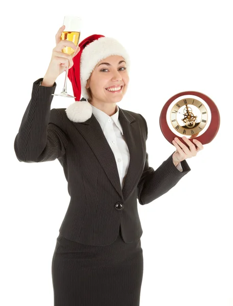 Бизнес-девушка в шляпе Санта-Клауса и с шампанским — стоковое фото
