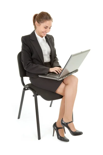 Kvinna och bärbar dator — Stockfoto