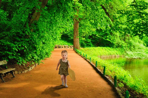 stock image A little girl runs to meet.