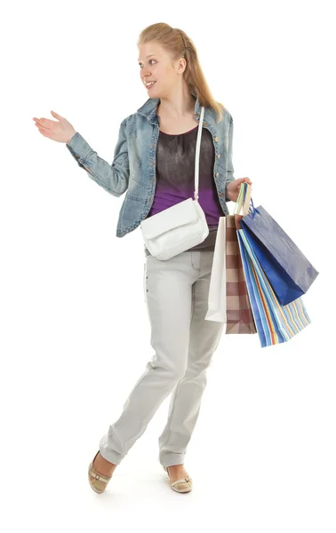 Chica joven con compras — Foto de Stock