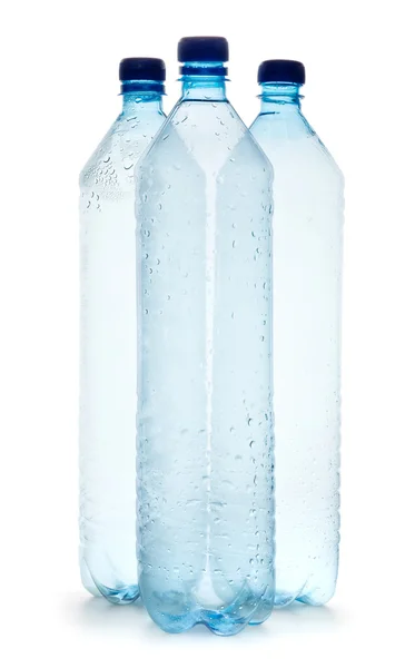 Egyszerű műanyag palackok, fehér háttér — Stock Fotó