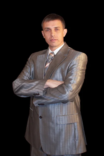 Портрет успешного бизнесмена на черном фоне — стоковое фото