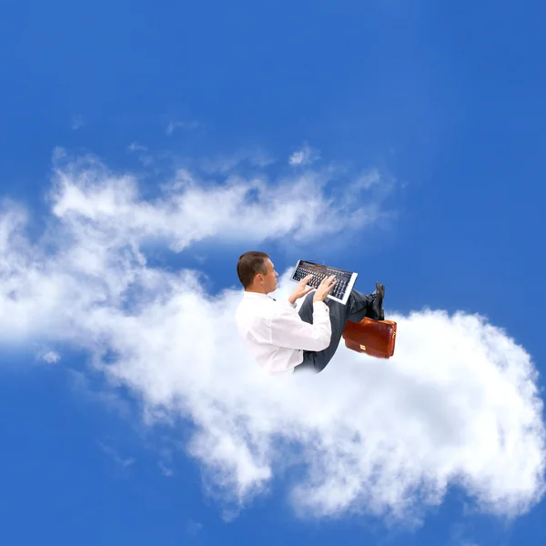 Geschäftsmann auf Wolke sieben — Stockfoto