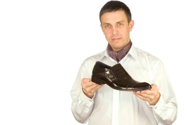 The elegant man always chooses the best model of footwear clipart