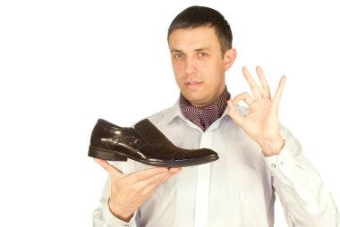 The elegant man always chooses the best model of footwear clipart