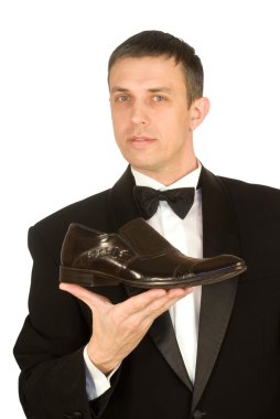 The elegant man always chooses the best model of footwear clipart