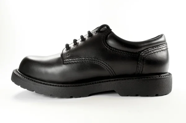Černé kožené boty. — Stock fotografie
