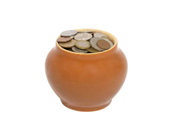 Ceramic pot with metal money. — Stock Photo, Image