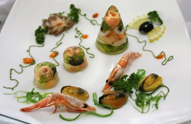 Cold appetizer of seafood with vegetables clipart