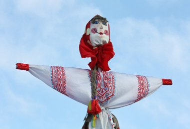 Carnival doll against the sky clipart