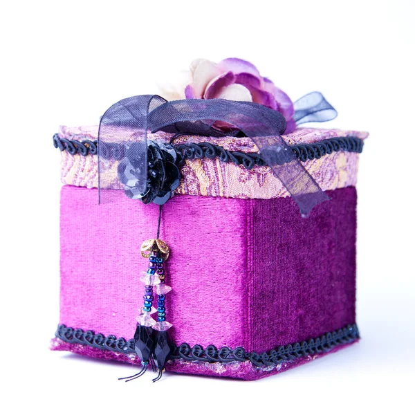 stock image Purple gift box with a rose isolated.