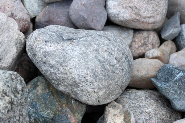 Στοίβα πέτρες πέτρες κτίριο ως φόντο — Φωτογραφία Αρχείου