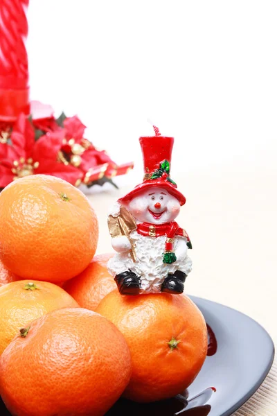 Pile Ripe Fresh Orange Tangerines Black Plate Snowman Golden Spade — Stock Photo, Image