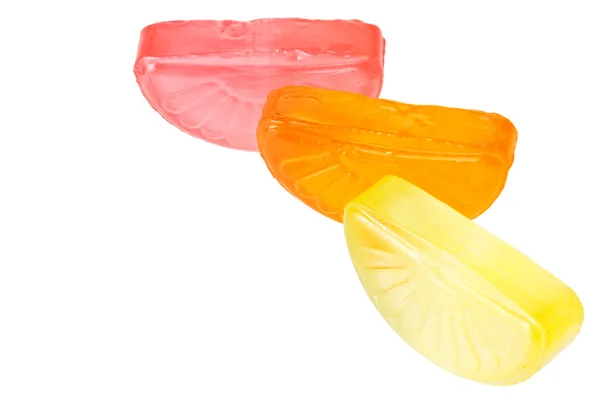 stock image Fruit drop lemon, orange and grapefruit sections isolated on white