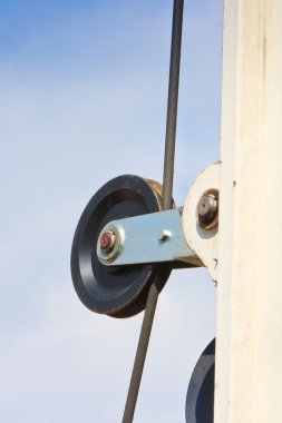 Block wheel of auger over blue sky clipart