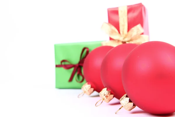 Christmas balls and gifts — Stok fotoğraf