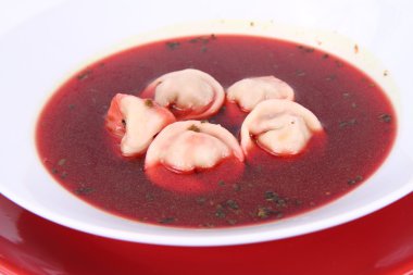 Traditional polish Christmas Eve dish: clear borscht with uszka (a mushroom filled kind of dumplings) clipart