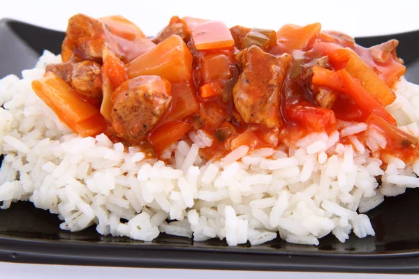 stock image Chinese food - sweet and sour chicken with rice