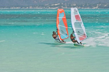 Windsurf in the lagoon clipart