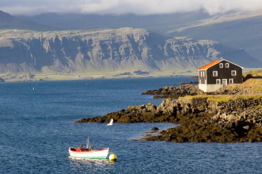 Djupivogur small fishing town in Iceland. Summer day. clipart