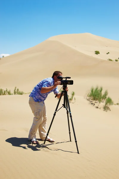 stock image The video operator in desert