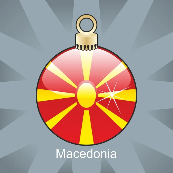 Makedonien flagga i jul glödlampa form — Stock vektor