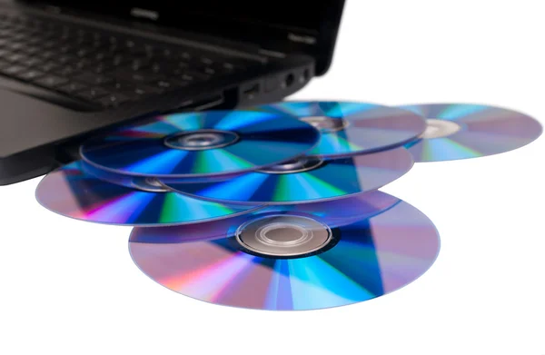 Ноутбук с большим количеством дисков — стоковое фото