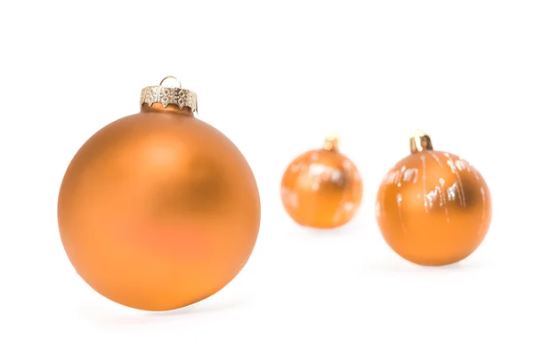 Three yellow Christmas balls — Stok fotoğraf