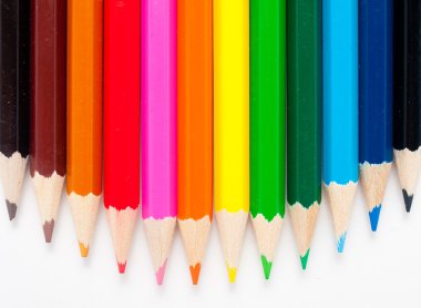 Varicolored color pencils set on white clipart