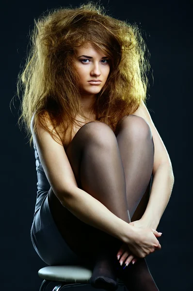 Portrait of the girl with a mad hairdress — Stock Photo, Image