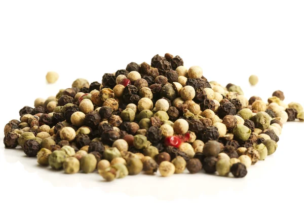 A lot of mixed peppercorns — Stock Photo, Image