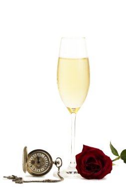 Cold glass with champagne with a red rose and a old pocket watch clipart