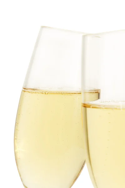 Aslope glas champagne bakom andra — Stockfoto