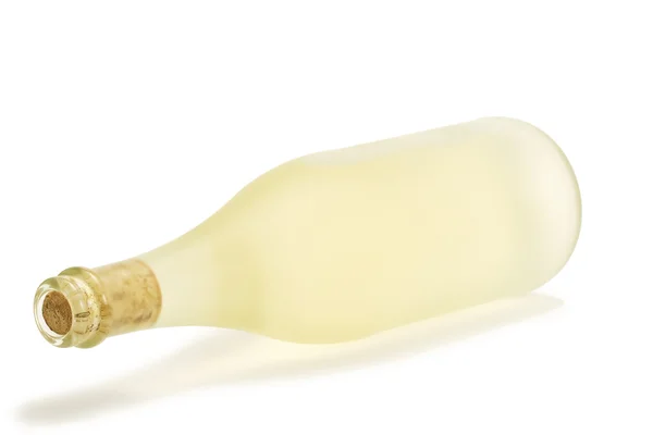 Lying dull prosecco bottle — Stock Photo, Image