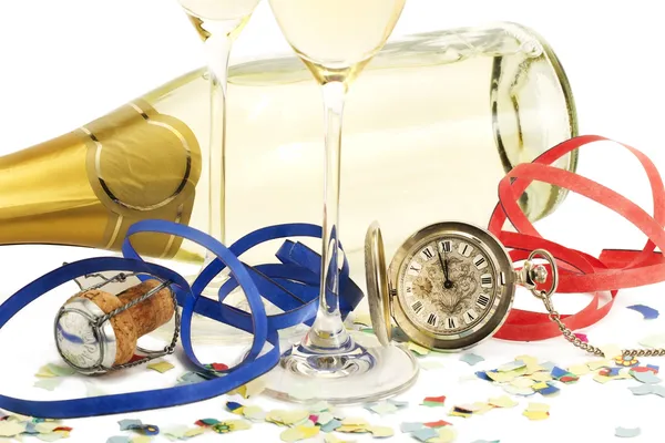 Two glasses with champagne, old pocket watch, streamer, cork and confetti i — Stock Photo, Image