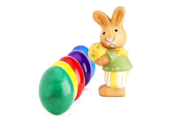 Easter Bunny Figurine Front Deep Row Easter Eggs White Background — Stock Photo, Image