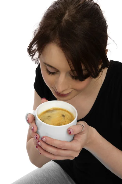 Young woman scenting coffee — Stock Photo, Image