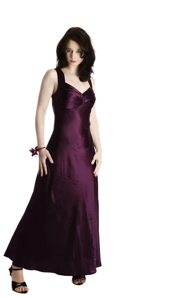 Young woman in purple evening dress — Stock Photo, Image