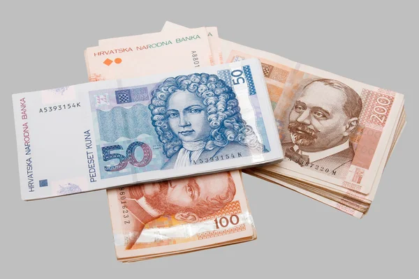 Croatian Kuna banknotes isolated on gray — Stock Photo, Image