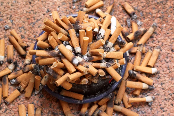 stock image Ashtray full of cigarettes close-up