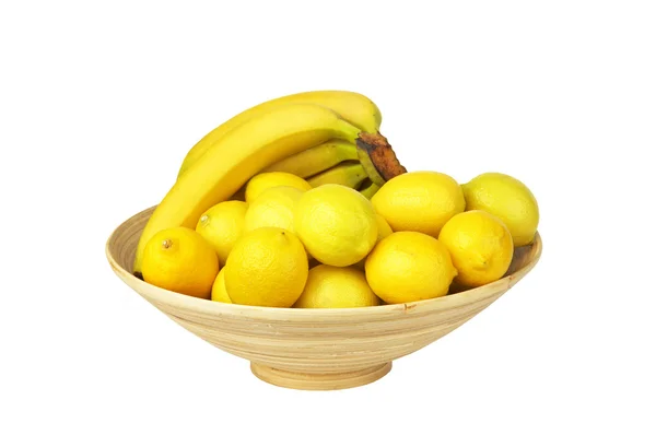 Тропические фрукты в тканой корзине изолированы. Банановый лимон. Для — стоковое фото