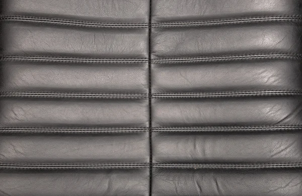Diagonale Textur aus schwarzem Leder. — Stockfoto