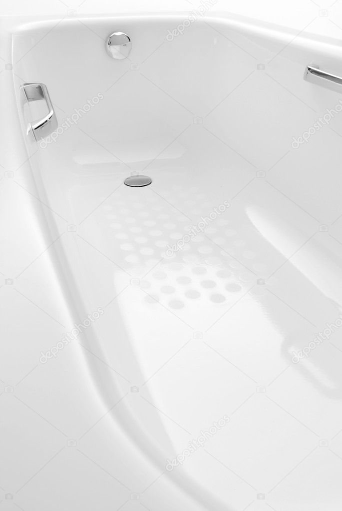 White ceramic bath tub. It is isolated on white background.