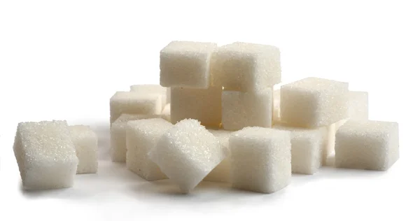 Egyösszegű cukor halom elszigetelt fehér background — Stock Fotó