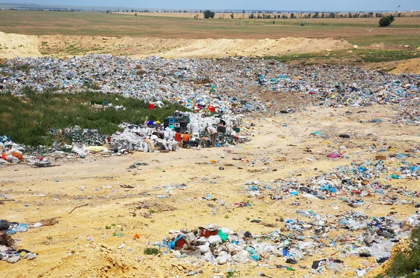 stock image Rubbish dump and piople on it