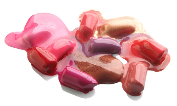 Multi-coloured scraps of lipstick on a mirror. lipstick color ba — Stock Photo, Image