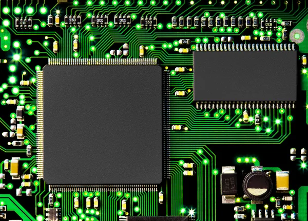 Computerplatine in grün mit Transistoren und Chip — Stockfoto