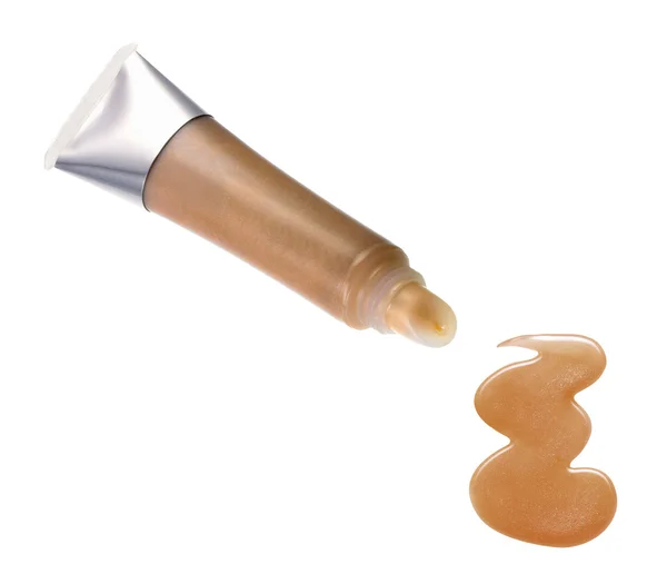 Liquid foundation spilled out of bottle isolated — Stock Photo, Image