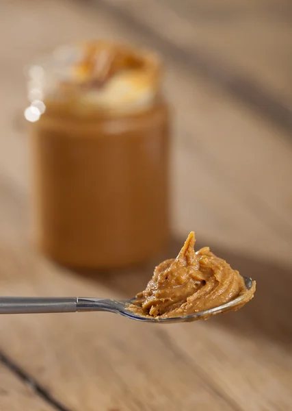 Spoon Filled Peanut Butter — Stock Photo, Image